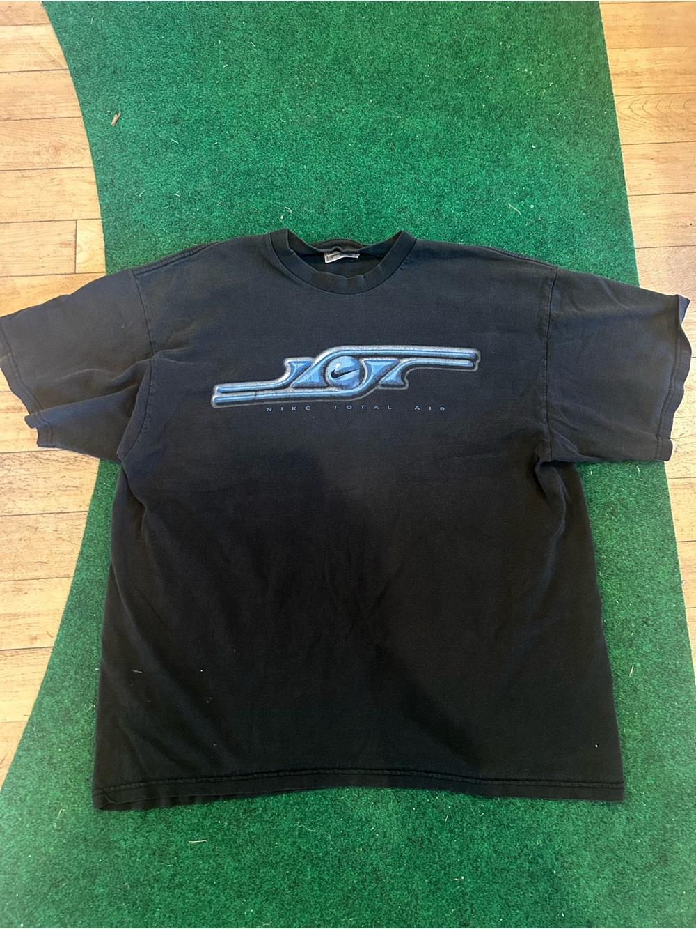 Vintage 1999 Nike Black T-Shirt with Blue Nike Total Air Graphic